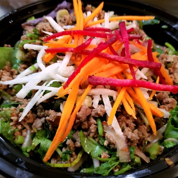 My Thai's Larb Gai, a Thai salad with minced chicken, herbs, and colorful julienned vegetables.